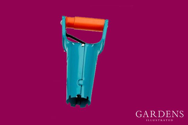 Gardena bulb planter on a pink background